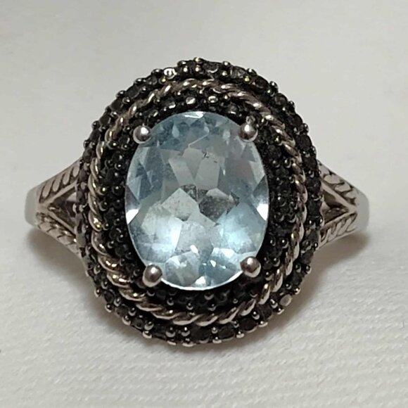 3.10ct Blue Topaz w/ .01ctw Round Black Diamond Accent Rhodium over Silver ring - Picture 1 of 13